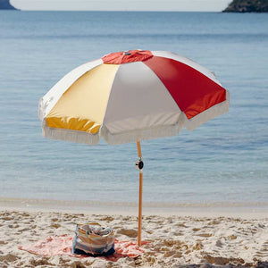 Bring a pop of color and pattern to your outdoor space with this premium beach umbrella.