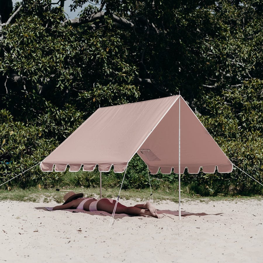 Bring some shade and style to your beach day with the Basil Bangs premium beach tent - portable, compact, and beautiful.