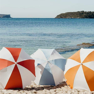 Compact, chic, and reliable - the Weekend Umbrella by Basil Bangs is your new go-to for beach trips and outdoor events.